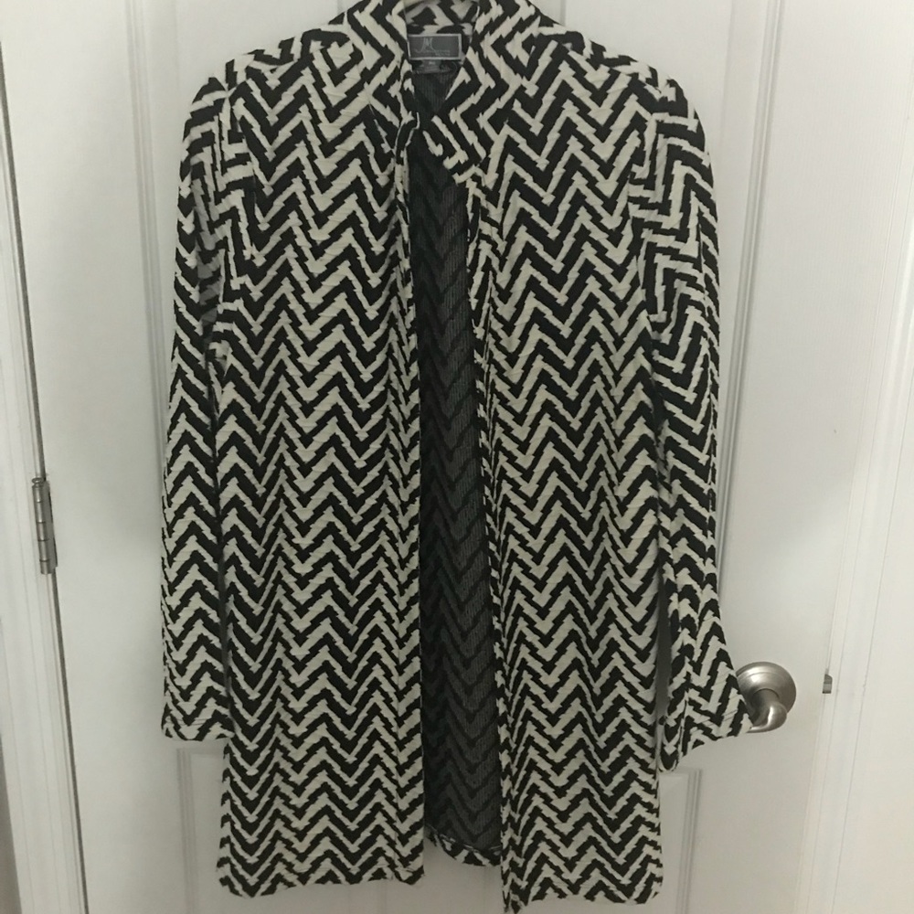 Black and white cute cover up shirt / sweater .